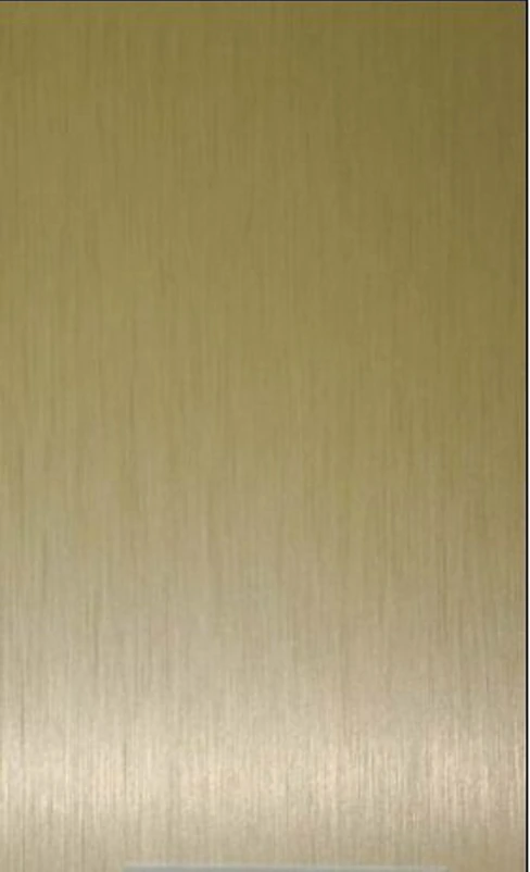 Close-up of a gold-toned brushed anodized aluminium surface