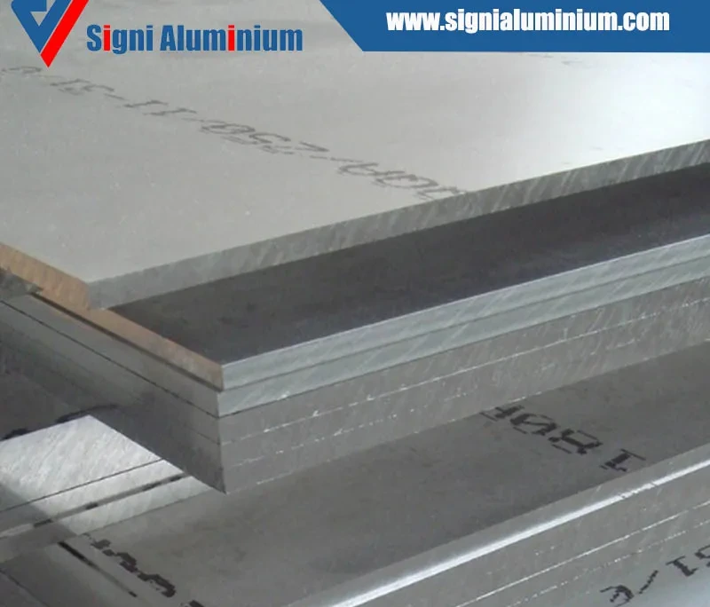 A stack of thick aluminium plates with sawn edges