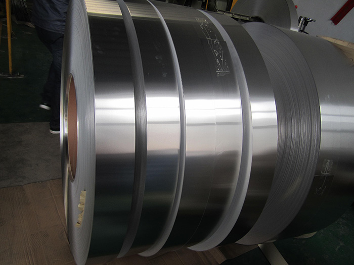 A wide aluminium strip coil with a bright rolled surface